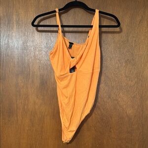 BNWT Orange Bodysuit